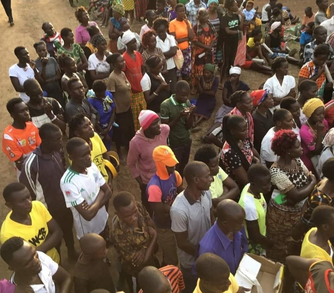A crowd gathered at a baraza