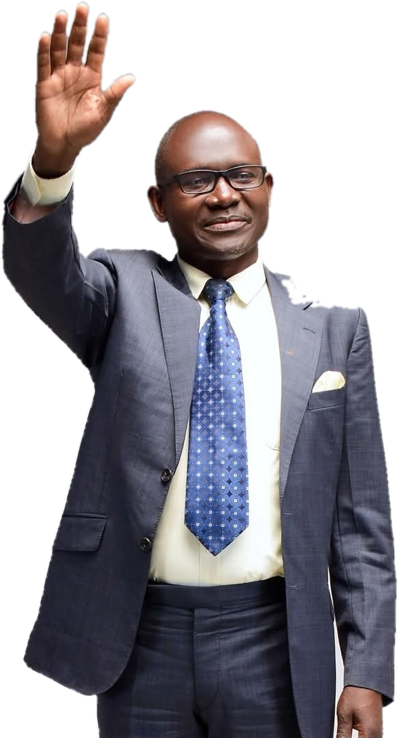 Dan Mogoria in a suit, waving